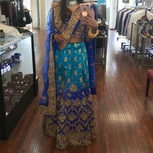 Turquoise and royal blue lengha with gold embroidery